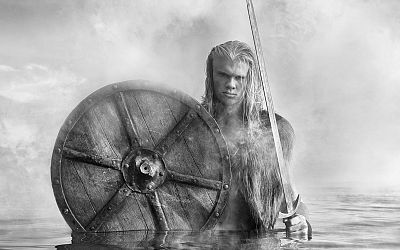 Erling Haaland dresses as a viking in freezing lake for stunning photoshoot complete with shield and huge sword