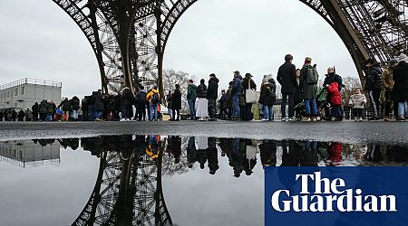 Eiffel Tower reopens to visitors after strike by workers who complained of rust