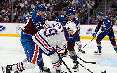 MacKinnon breaks franchise's single-season points mark as Avalanche beat Oilers