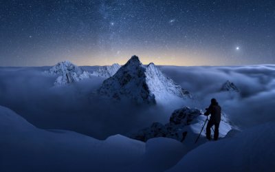 A snowy peak rising from the clouds. Slovak photographer's stunning image wins award