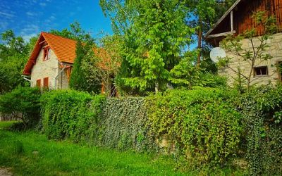 Where is the Alberobello-style stone-house village in Romania?