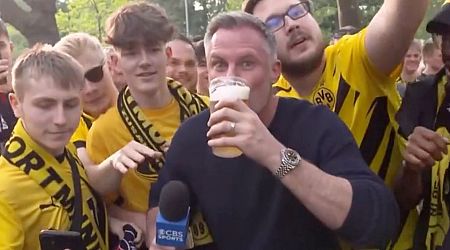 Jamie Carragher downs beer on live TV after being egged on by Dortmund fans