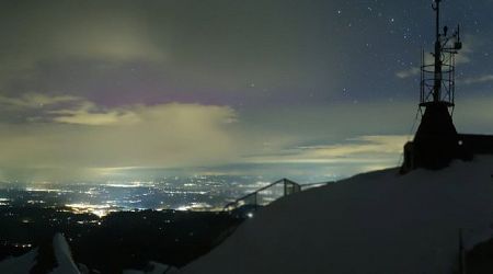 Northern lights illuminate the Swiss night sky
