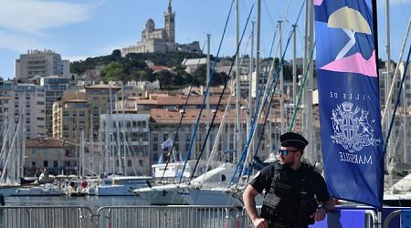 Olympic flame arrives in Marseille, starts coastal parade