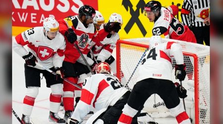 Bedard scores 2 again as Canada downs Denmark at hockey worlds