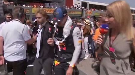 TV reporter dragged off F1 grid by security in middle of Max Verstappen interview