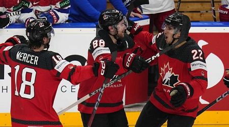 Cozens OT goal lifts Canada to top spot in group play at men's hockey worlds