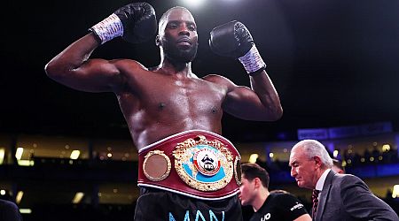 Lawrence Okolie wins bridgerweight world title with ruthless first-round victory over Lukasz Rozanski