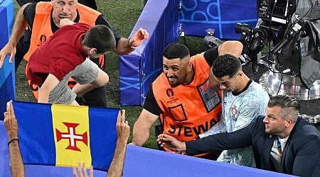WATCH: Portugal's Cristiano Ronaldo Narrowly Avoids Fan Who Jumped from Crowd After Defeat to Georgia