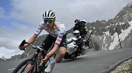 Pogacar flexes his muscles to reclaim yellow jersey in first mountain stage
