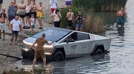 Bathers help drag a "cyberstuck" Tesla truck out of lake