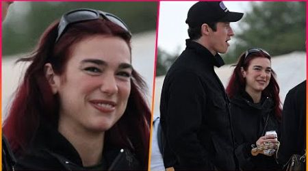 Dua Lipa coordinates with boyfriend Callum Turner in matching black outfits as they enjoy day four