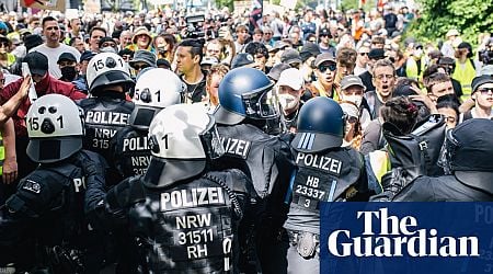 Two police officers hospitalised after attack by protesters at far-right AfD congress in Germany