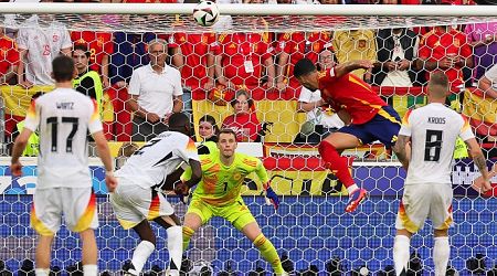 Spain beat Germany in overtime thriller to book semis