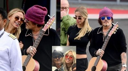 Johnny Depp seen looking cozy with stunning blonde beautician while travelling out of London Helipo