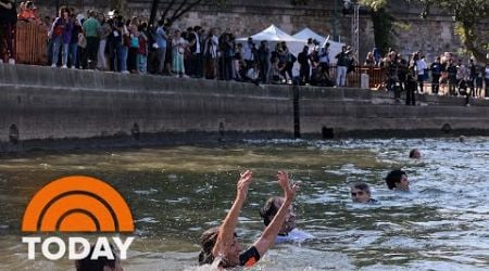 Mayor of Paris follows through on promise to swim in Seine