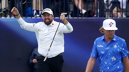 Shane Lowry leads Open as he refuses to be deterred by windy Troon