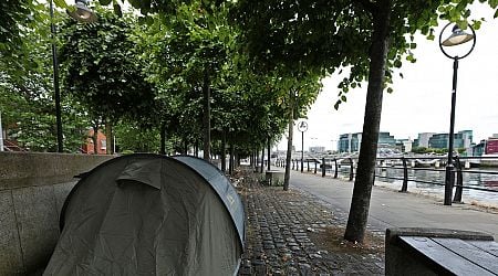 Volunteers guard tents of asylum seekers overnight amid rising threat of violence