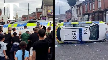 Leeds riot: moment crowd overturns police car