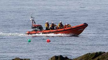 Dramatic lifeboat rescue as two people removed from rocks off Irish coast after cut off by tide