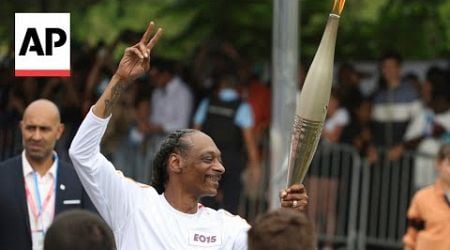 WATCH: Snoop Dogg carries Olympic torch ahead of Paris opening ceremony