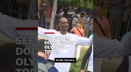 &#39;Lighting it up&#39;: Watch Snoop Dogg carry Olympic torch