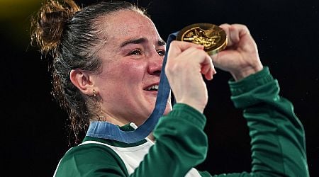 In pictures: Kellie Harrington celebrates with gold medal on podium after Olympic win