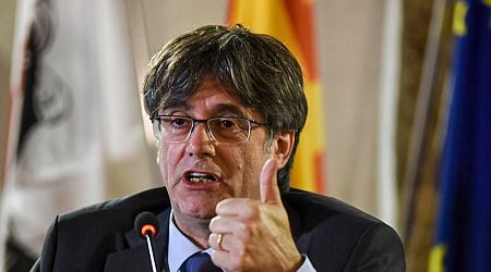 Ex-Catalan leader Puigdemont headed back to Spain despite fear of arrest