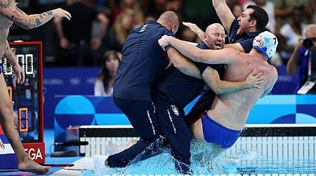 Team Serbia Celebrates Its Gold Medal in Water Polo