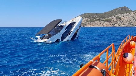 Watch: German family are rescued from their luxury yacht off the coast of Spain before it sinks to the bottom of the sea