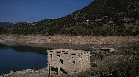 Sunken village emerges in Greece as drought dries up lake