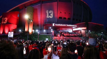 Fans gather at candlelight vigils for Gaudreaus in Calgary, Columbus