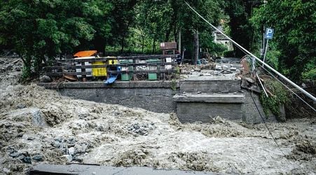 Man missing after flash floods sweep away tractor