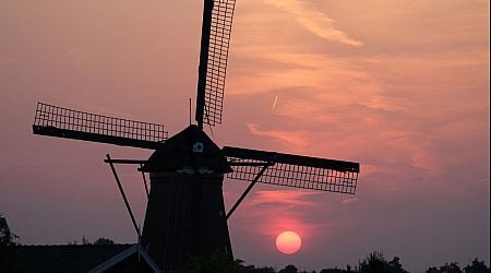 Historic Dutch windmills light up Netherlands' sky