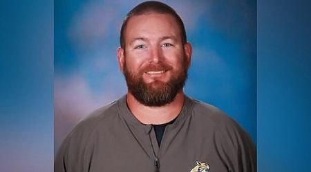 Teacher fatally shot by his classroom doorway: 'He was trying to crawl back to us'