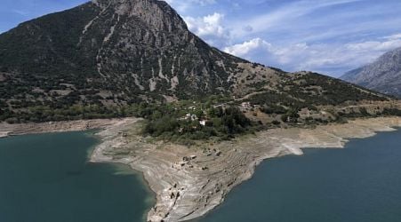 Ruins of a long-sunken Greek village emerge as drought saps a vital reservoir