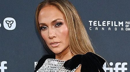 J-Lo shows Ben Affleck what he's missing in racy dress at film premiere as exes avoid awkward run-in