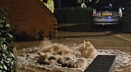 Sudden downpours in Midlands town leaves football stadium submerged and water gushing out of sewers