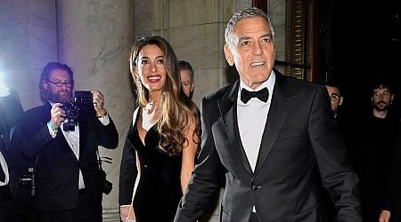 George Clooney plays photographer at star-studded charity event