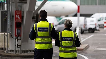 Checking passports with immigration control at Dublin Airport