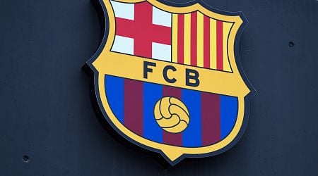 Barcelona fans banned for one Champions League game for Nazi-style flag