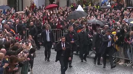 Thousands brave the rain to see Pope Francis in Belgium's Leuven