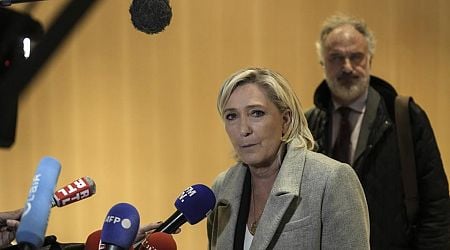 France's Le Pen denies wrongdoing as she and her party go on trial accused of embezzling EU funds