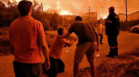 Raging wildfires in central Greece leave two people dead