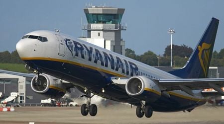 Ryanair flight abandoned and passengers evacuated after plane catches fire