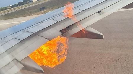 Ryanair plane catches fire forcing nearly 200 passengers to use emergency slides