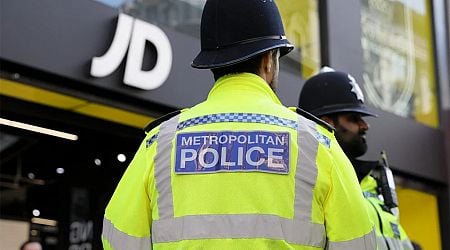 UK police officers overturn misconduct charge over search of two black athletes