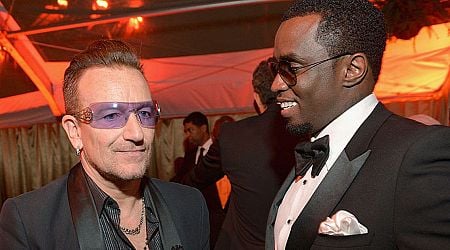 U2's Bono appears to dodge kiss from Sean 'Diddy' Combs in toe-curling footage