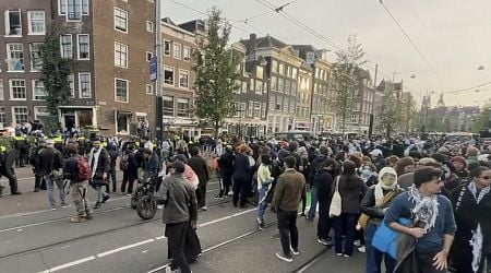 Smoke bomb thrown at Amsterdam memorial of Hamas assault; Arrests at Pro-Palestinian rally