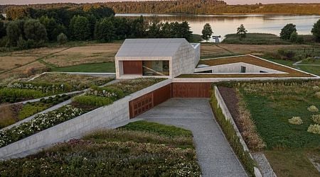 Green roofs and rustic charm unite in a contemporary masterpiece